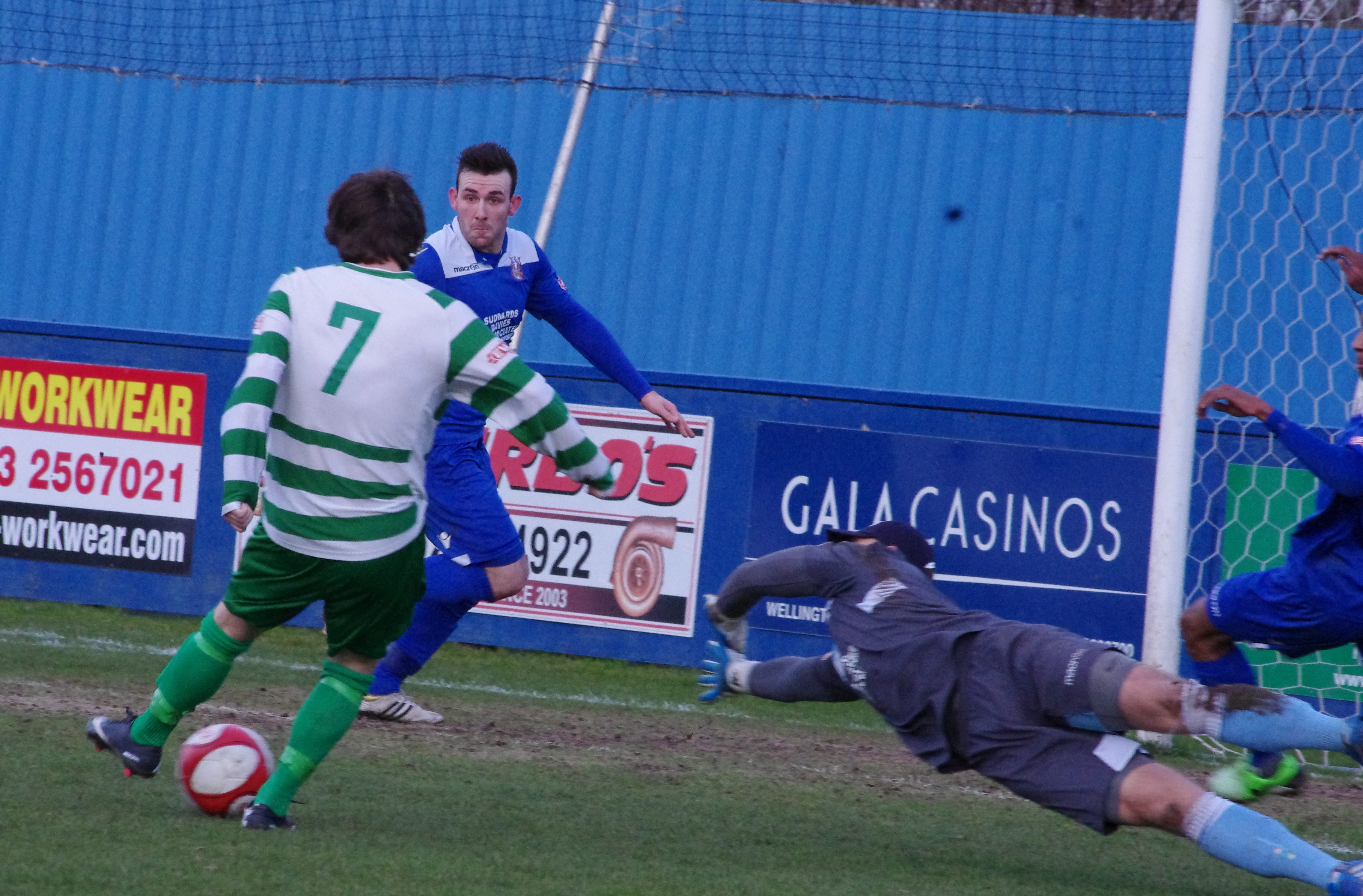 Paddy Miller positions himself to clear Joe Holt's goal-bound attempt off-the-line