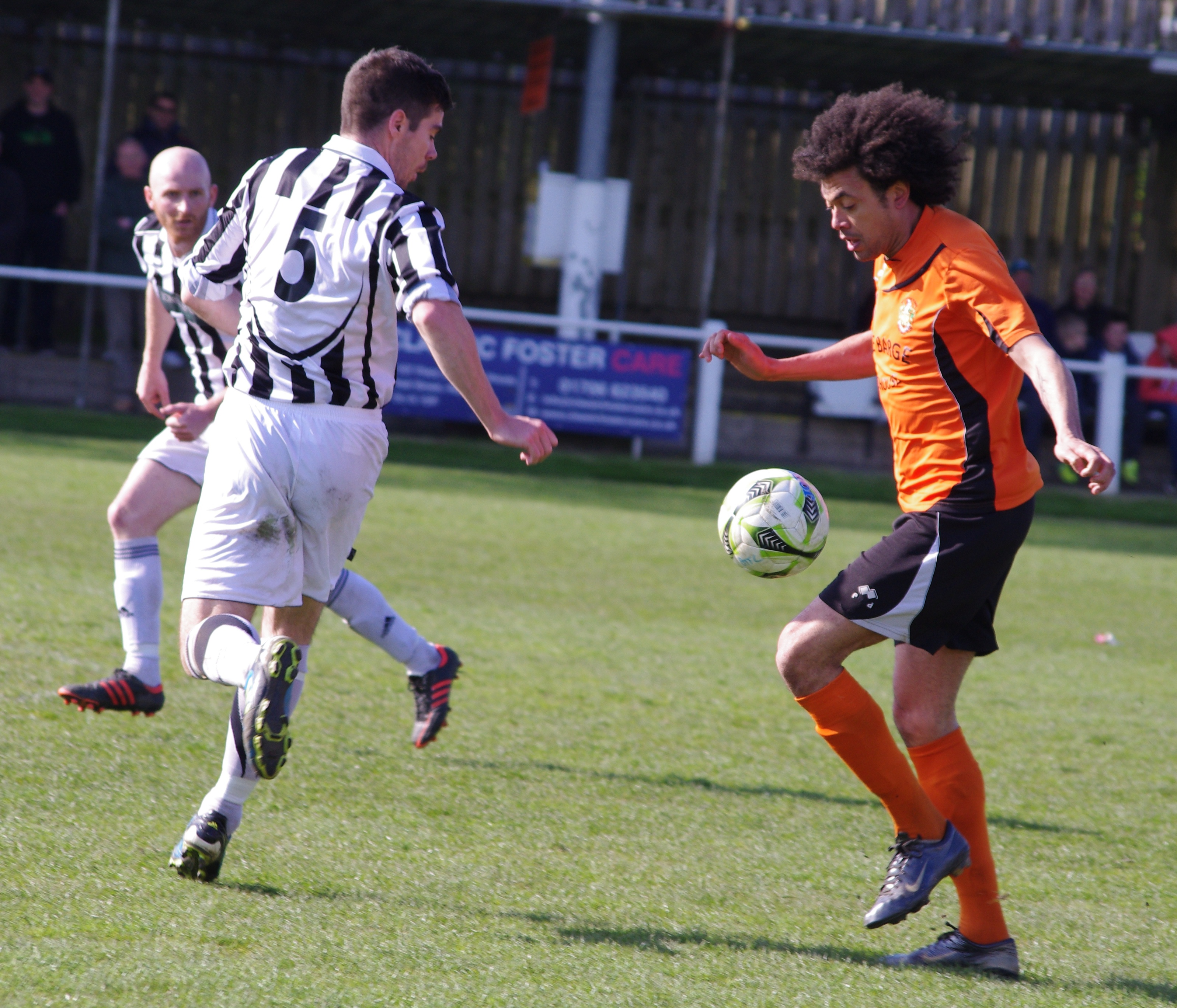 Jason Price in action for Brighouse Town in their title-winning 2-0 win over Retford United