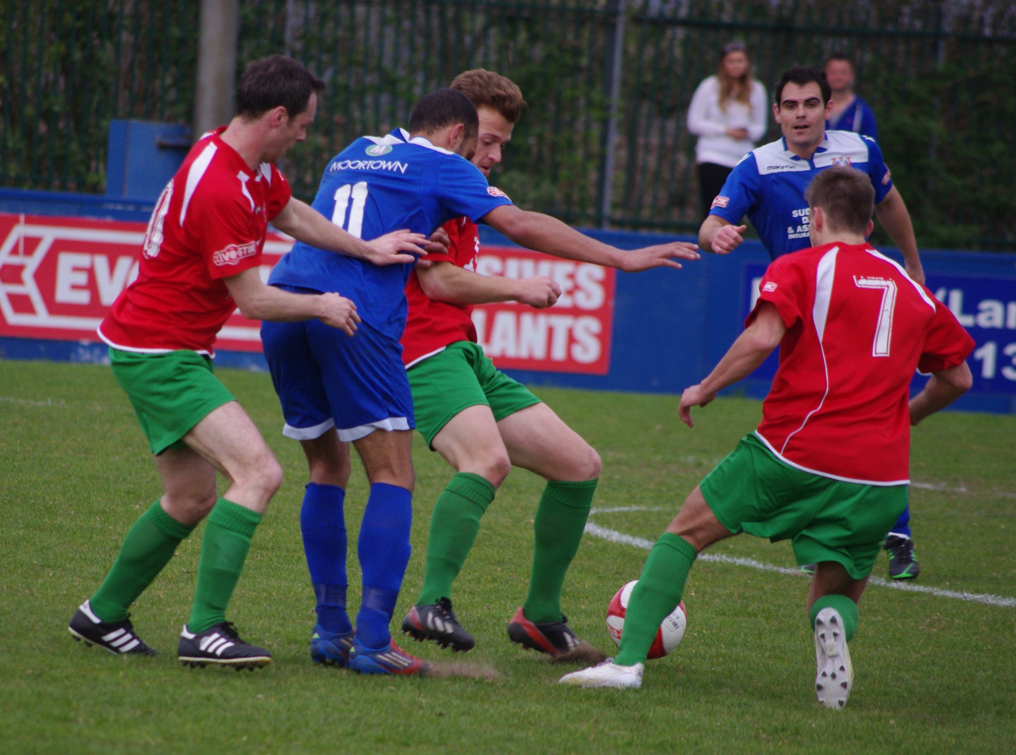 No way through: Matty James is surrounded by three Harrogate Railway players