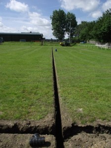 Workmen put an 18 inch hole ground to improve the drainage - as part of a £98,000 project