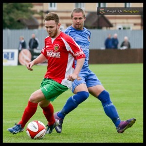 Harrogate Railway's top marksman Nathan Cartman hit the decisive third goal as Railway reached the FA Cup second qualifying round for the first time since 2007
