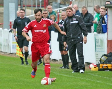 Dave Merris strides forward for Ossett Town in their 2-0 defeat to Darlington 1883. Photo: Mark Gledhill