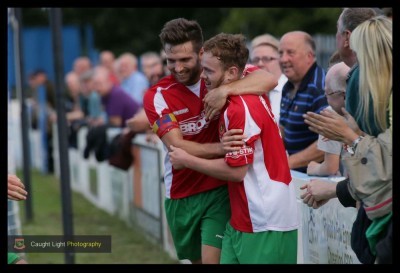 Railway captain Jason Mycoe congratulates Nathan Cartman after his equaliser. Photo: Caught Light Photography