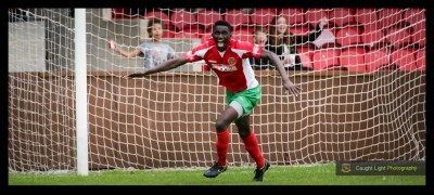 One of his finest moments: Lamin Colley, who is set to move to Bradford (Park Avenue) celebrates equalising for Harrogate Railway in the FA Cup first qualifying round win over Clitheroe. Photo: Caught Light Photography