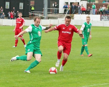 Rob Bordman on the attack for Ossett Town in their 2-0 defeat to Darlington. Photo: Mark Gledhill