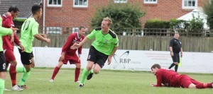 Skipper Paul Sykes celebrates his winning goal on the stroke of half-time which sent AFC Emley to the top of the Division One table. Picture: Mark Parsons