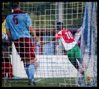 Lamin Colley celebrates dragging Railway back into the game at 3-2. Photo: Caught Light Photography