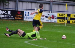 Nick Thompson goes past Maltby goalkeeper Ben Brunt for goal number six