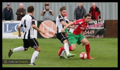 Rob Youhill striding forward for Harrogate Railway