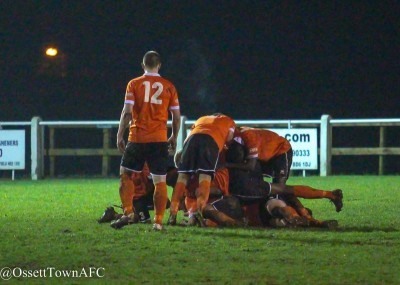 Brighouse Town celebrate Chris Fisher's late winner. Picture: Mark Gledhill