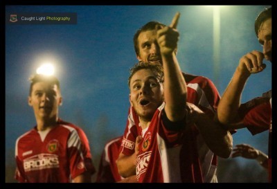 Nathan Cartman celebrates completing his hat-trick by running to the Harrogate Railway fans. Photo: Caught Light Photography