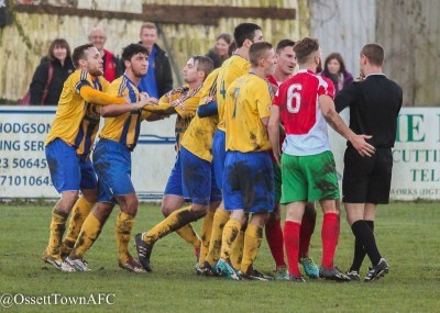 Chaos ensued as referee Jan Suchecki lets players surround him before Akeroyd is sent off