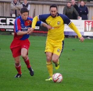 Former Manchester United midfielder Jonathan Greening strides forward for Tadcaster