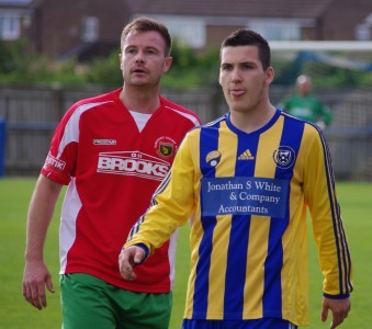 New Brighouse Town midfielder Jay Davis (right) in action for Garforth Town
