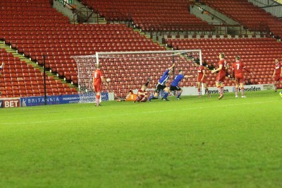 Shaw Lane players turn to celebrate after Stefan Holt's second goal hits the net. Photo: White Rose Photography