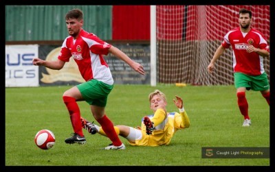 Mike Morris in action for Harrogate Railway against Farsley AFC. Picture: Caught Light Photography