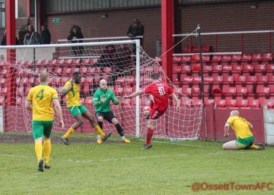 Danny Cunningham scores the winner for Ossett Town in the 3-2 victory over Brighouse Town. Picture: Mark Gledhill