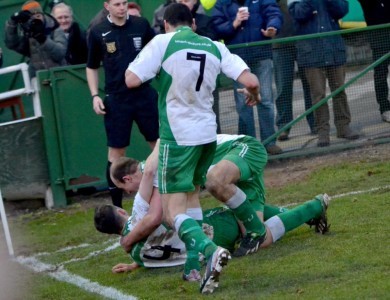 North Ferriby United celebrate their captain Liam King's dramatic winning penalty in the FA Trophy quarter-final win over Ebbsfleet. Picture: John Rudkin