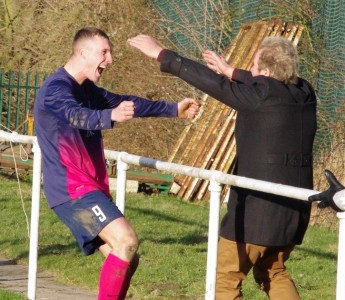 Shaw Lane striker Joe Thornton runs to his best mate Lee Morris' father after Matt Thornhill put Shaw Lane Aquaforce 3-1 in front at Nostell Miners Welfare in February 2015