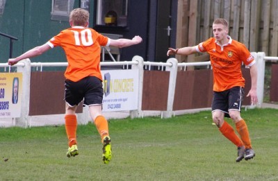 They think it is all over: Issac Baldwin and Ryan Hall celebrate's Brighouse's third goal in the 3-2 win over Mossley