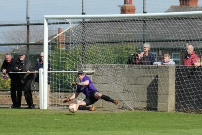 Adam Stevens can't stop Max Leonard's penalty from finding the net