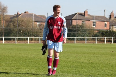 AFC Emley captain Paul Sykes walks off disappointed after his side's promotion hopes came to an end