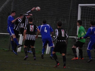 Luke Danville heads Pontefract Collieries in front in the 7-0 win at Penistone