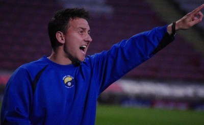 Graham Nicholas urges his Garforth side on during his side's defeat in the West Riding County Cup final 