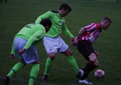 A tussle in AFC Emley's 3-2 win at Worsbrough Bridge