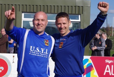 Former Pontefract Collieries captain Nigel Danby (left) and manager Nick Handley (right) celebrate winning promotion back in April
