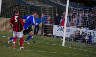 Andrew Fox scores Shaw Lane's best goal of the night to seal their promotion