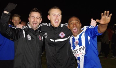Shaw Lane Aquaforce assistant manager Daz Smith, manager Craig Elliott and midfielder Anton Foster celebrate winning promotion