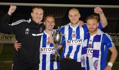 Shaw Lane Aquaforce manager Craig Elliott celebrates winning the Toolstation NCEL Premier Division with Luke O'Brien, captain Sam Denton and Danny Frost