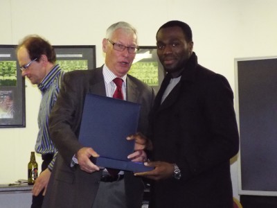 Chib Chilaka collects one of his awards from Bradford (Park Avenue) vice president John Helm