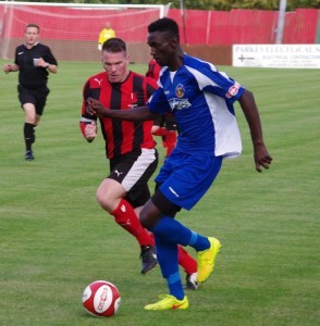 Former Harrogate Railway striker Lamin Colley has signed for Stockport County