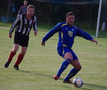 Experienced NCEL player Nathan Kamara shields the ball