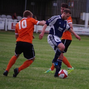 Eccleshill midfielder Andy Cooper controls the ball during their 7-1 defeat to Brighouse 