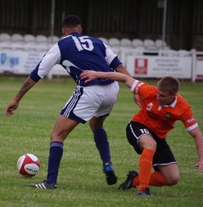 Nathaniel Dacres (left) outmuscles Ryan Hall, but Brighouse still came out 7-1 winners