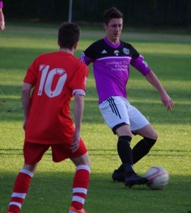 Ross Shelton controls the ball