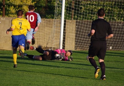 Ossett Town goalkeeper Tom Morgan denies Jordan Coduri 