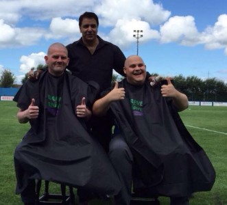 Farsley Celtic officials Rob Winterbottom and Josh Greaves look happy with their new 'do's' after shaving their heads for charity.