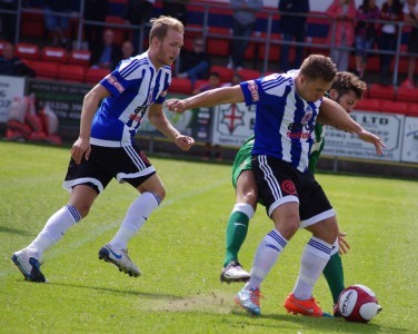 Grant Darley battles for the ball during Shaw Lane's 1-0 win over Bradford (Park Avenue)