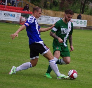 Shaw Lane's Adam Priestley tries to stop Avenue's attack