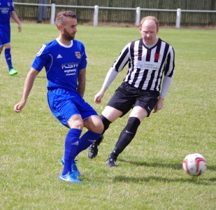 Pontefract midfielder Luke Forgione plays a pass