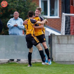 Kieran Thompson celebrates scoring the winner for Ossett Albion in the derby clash with Ossett Town