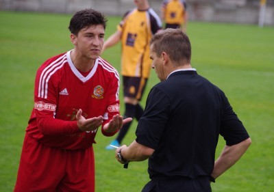Sam Akeroyd giving his views on Tyrone Gay's late caution 