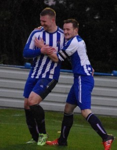Tom Rose congratulates Craig Heard after the striker scored Yorkshire Amateur's first goal