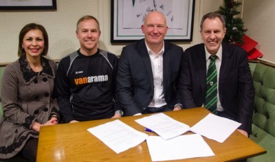 Billy Heath and Mark Carroll (second left) after signing new three year contracts with joint owners Eman (left) and Steve Forster (right).