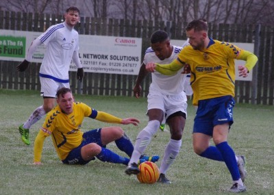 Corey Gregory tries to win the game on the wintry pitch