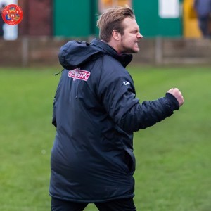 Get in there! Grant Black celebrates Alex Peterson's winner for Ossett Town. Picture: Mark Gledhill